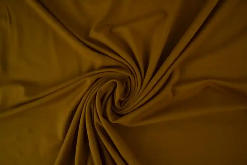 Aanbieding Katoen tricot – Donker okergeel