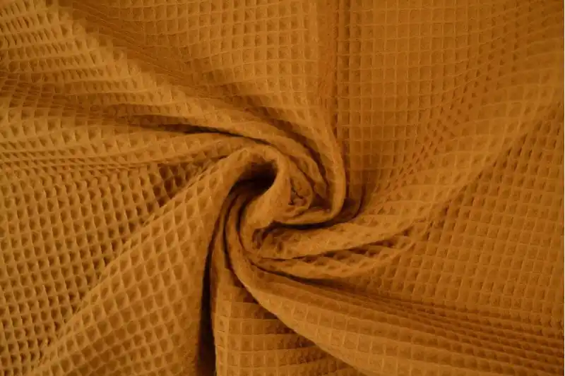 Wafelstof – Donker okergeel Must-Have